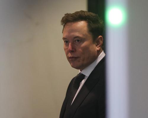 ‘Your questions are designed to trick me’: combative Musk grilled over battle with Sam Altman