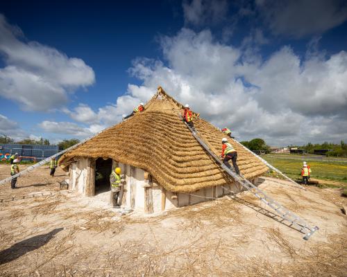 English Heritage unveils recreation of 4,500-year-old Neolithic hall near Stonehenge