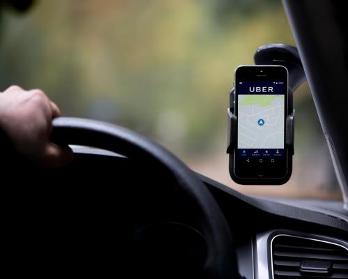 Dynamic pay on platforms such as Uber should be banned, says TUC