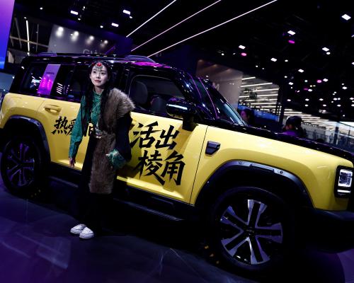 ‘Look, no hands’: China chases the driverless dream at Beijing car show