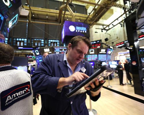 Stock markets rally and US dollar dips after supreme court rules against Trump’s sweeping tariffs; Hat-trick of good UK economic news – as it happened