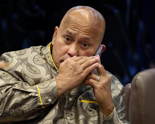 Gunshots fired in Philippines senate in standoff with senator wanted by ICC