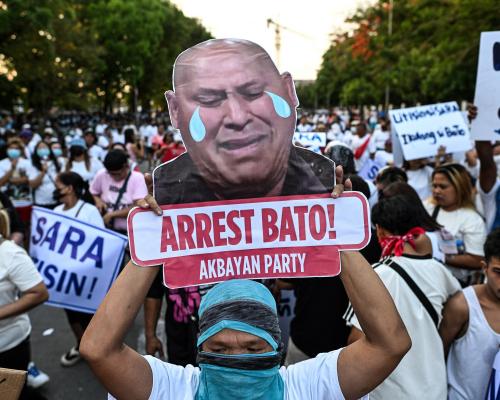 Philippines authorities investigating reports lawmaker wanted by ICC has fled after taking refuge in senate