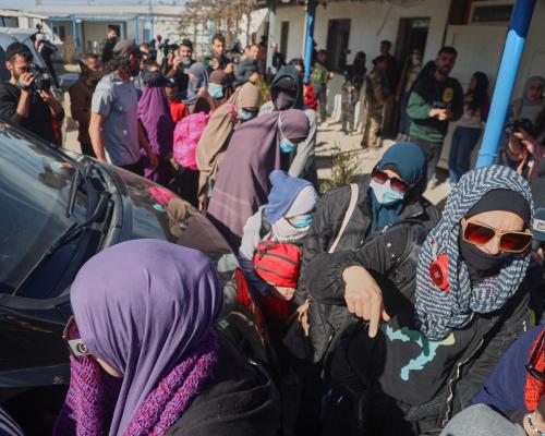 Australian families in convoy from Syrian camp warned they would be attacked unless they turned around